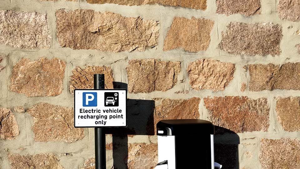 parking sign next to wall
