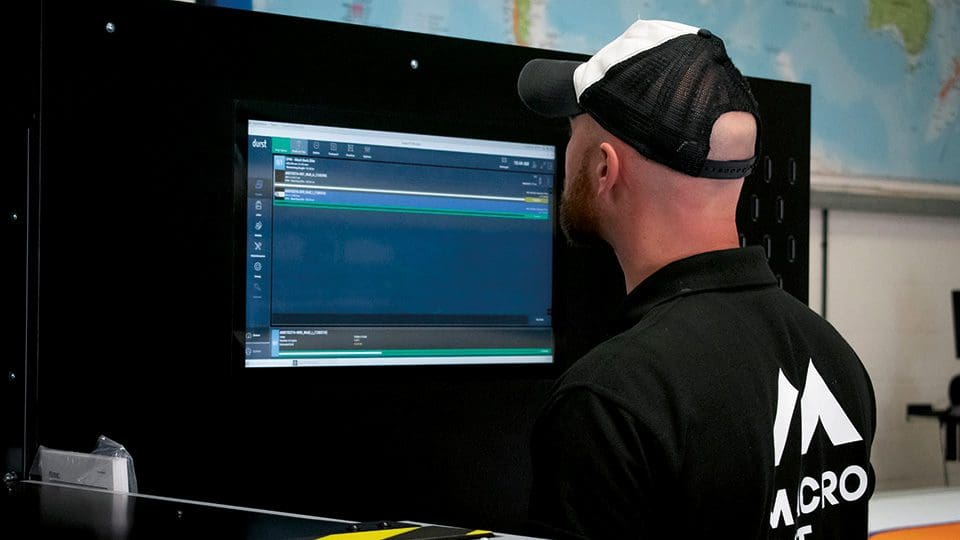 man looking at screen