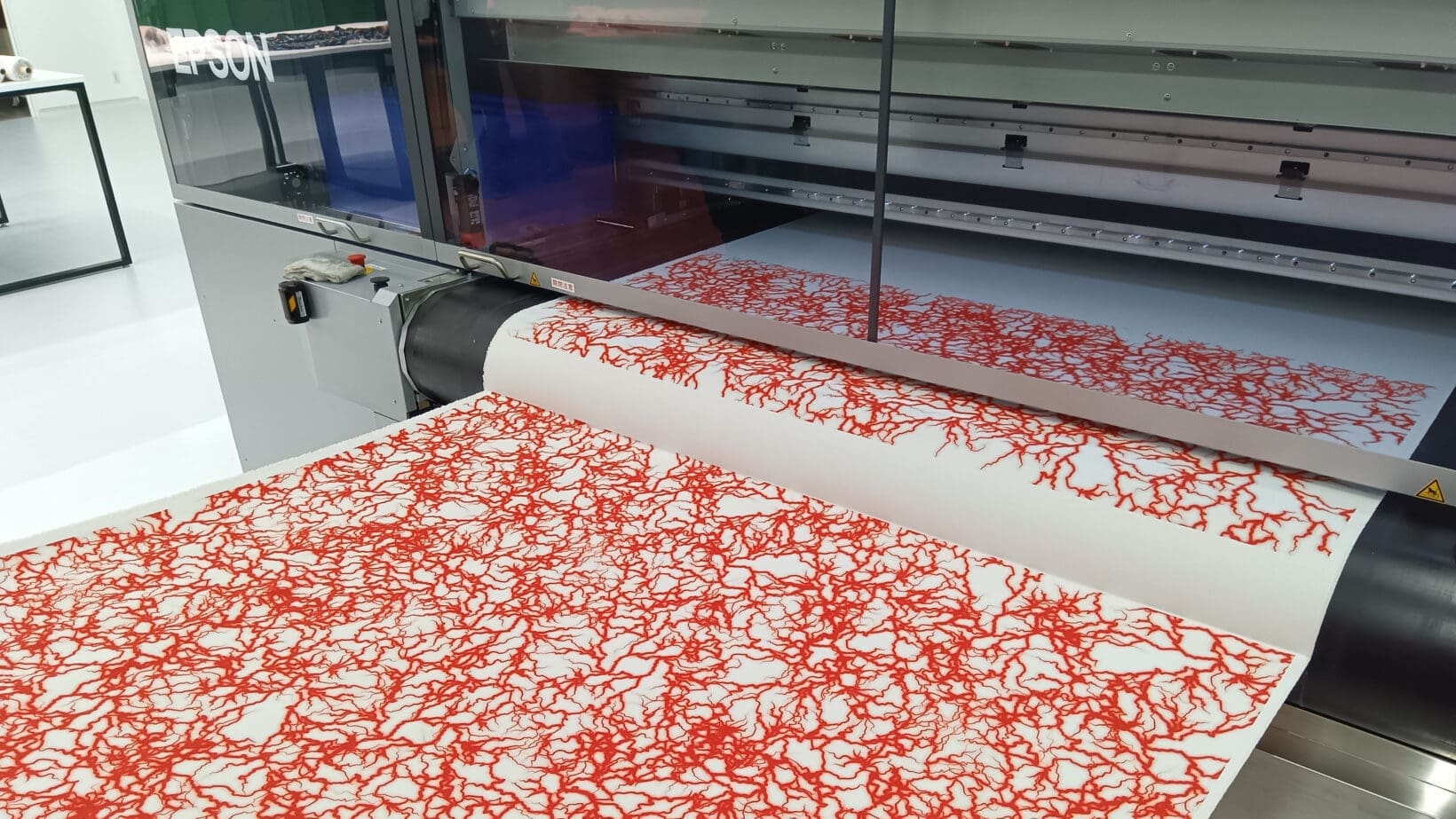 Image showcasing Sustainable textile innovation showcased at fashion show - SignLink
